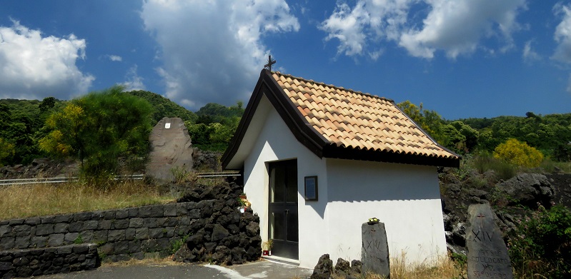 chapel surrounded by lava